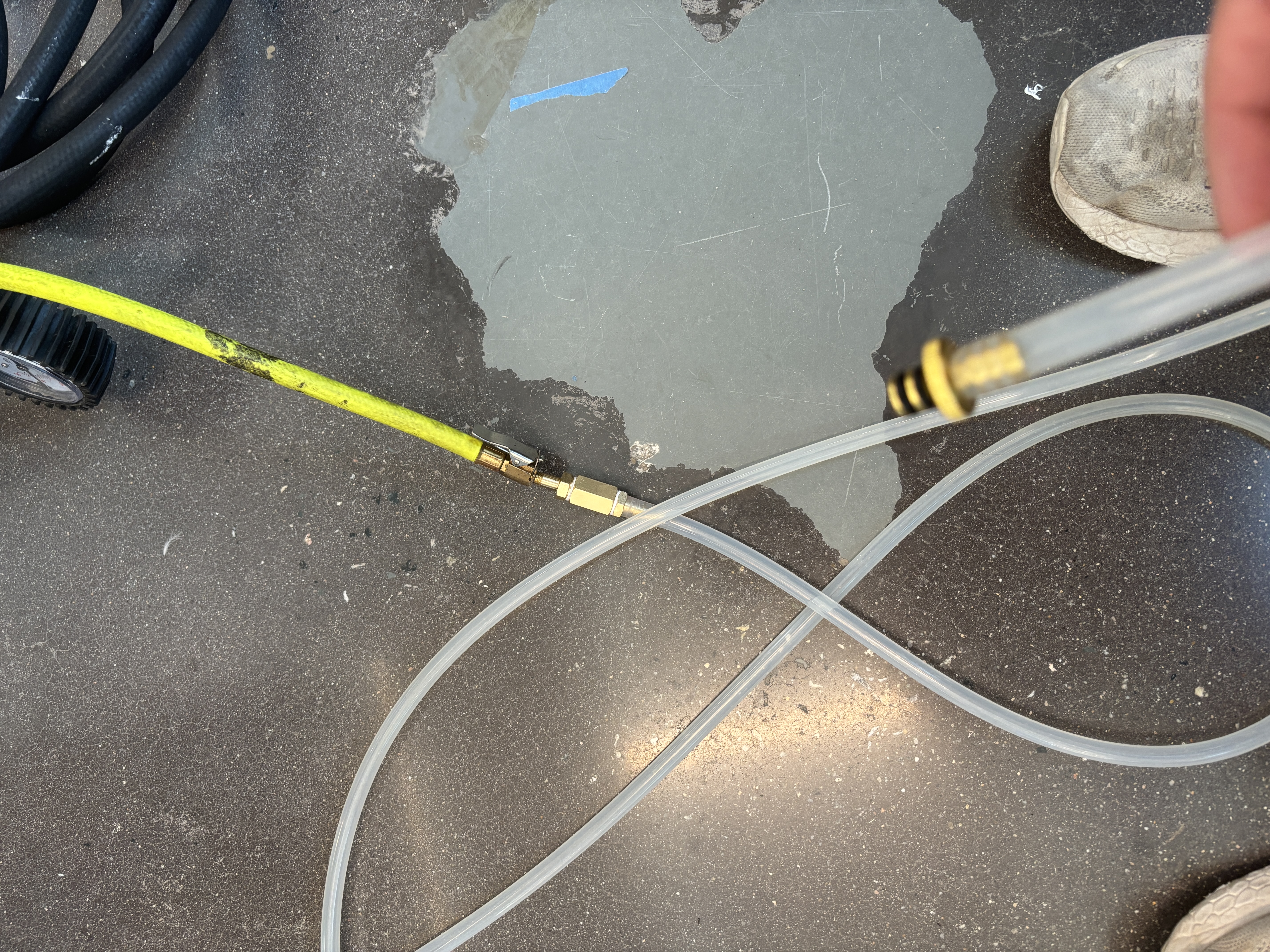 Connecting the air pump to the vacuum tube.