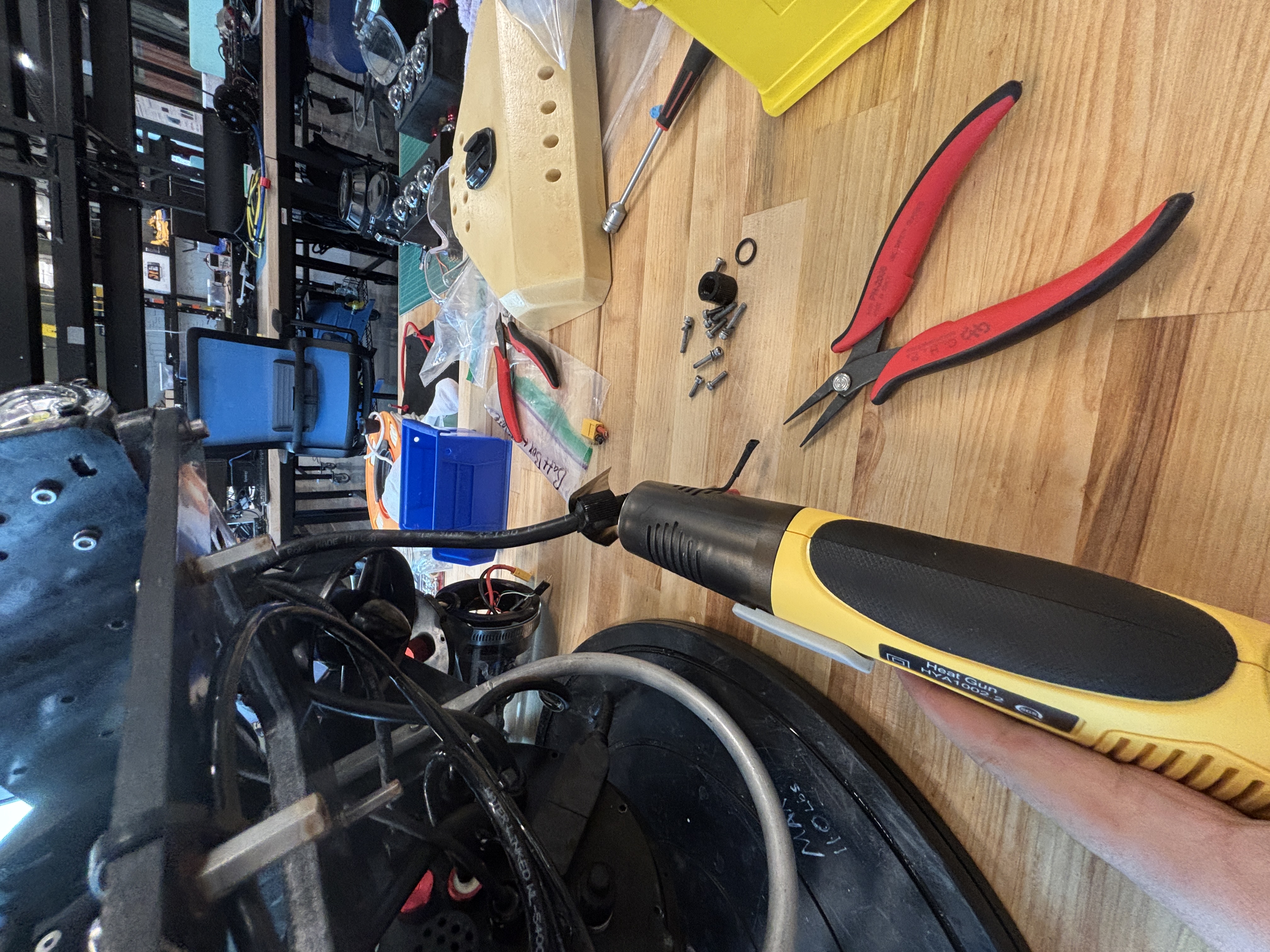 Using a heat gun to degrade the faulty epoxy.